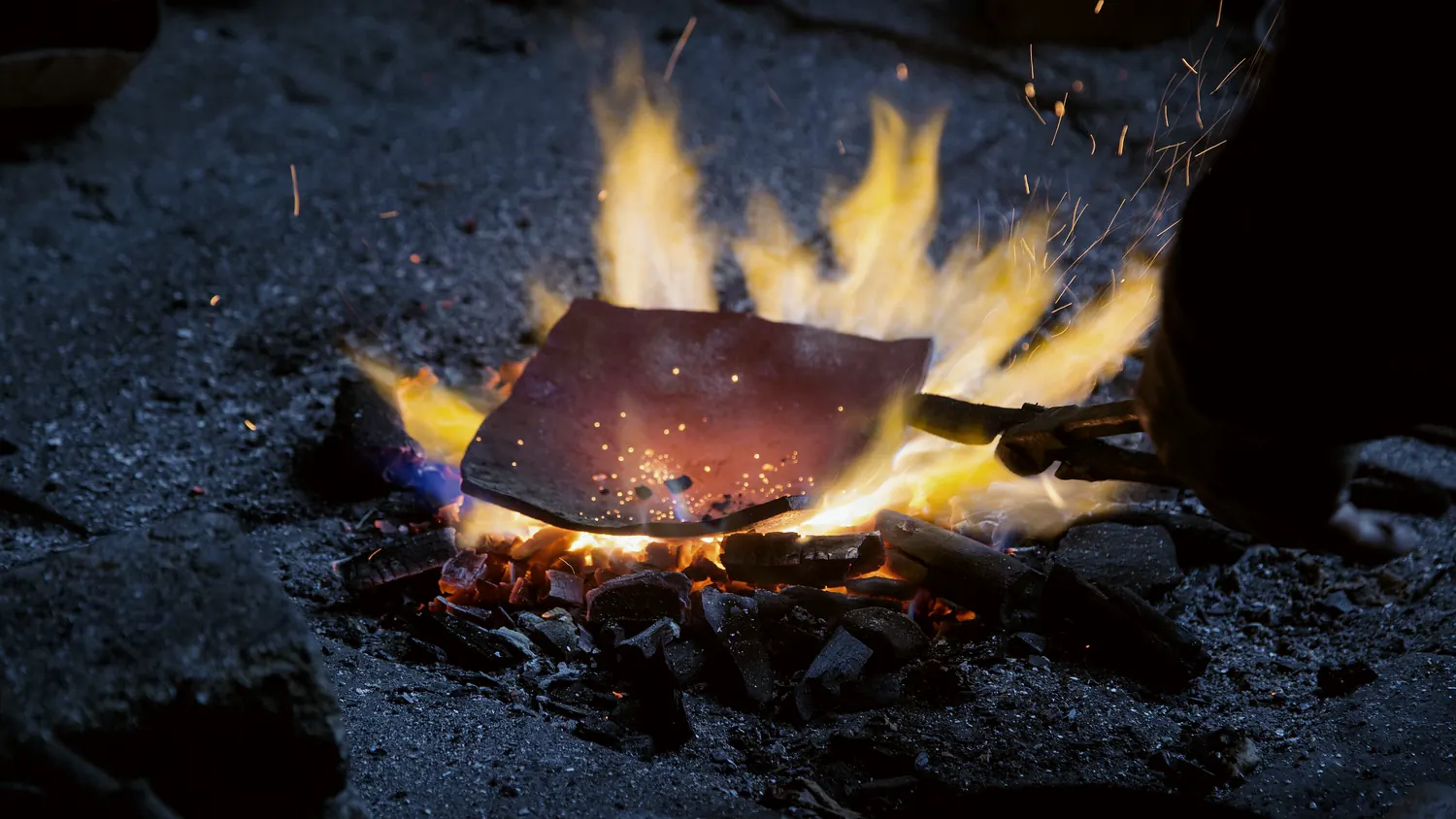 Copper heating in a workshop forge