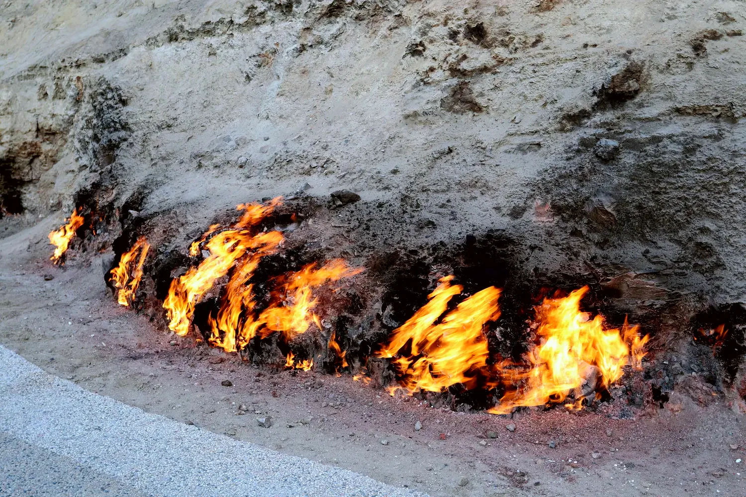 Burning along the base of the slope